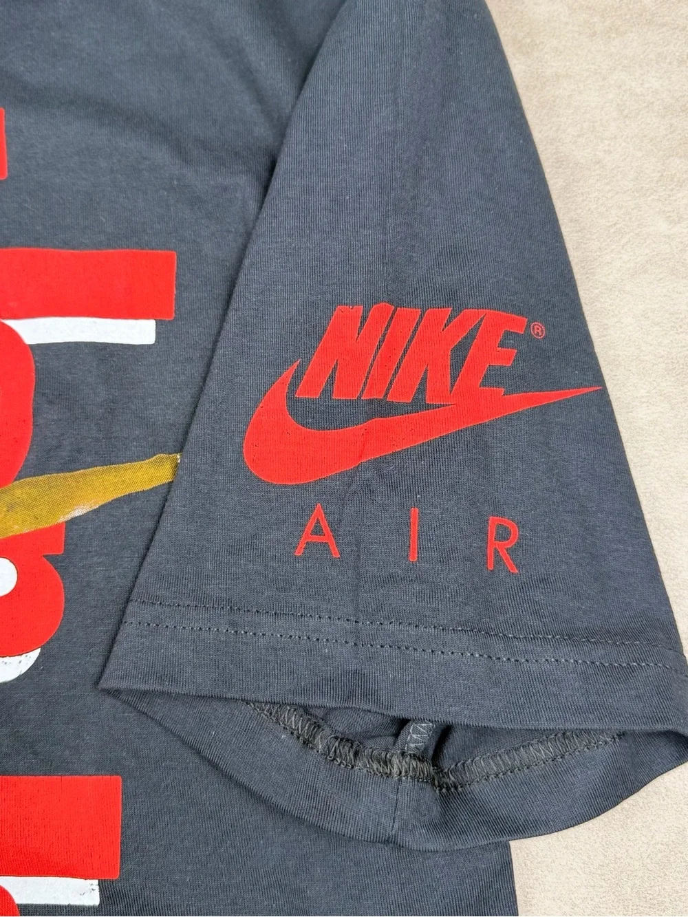 Jordan Black Tee with Red Jumpman Detail